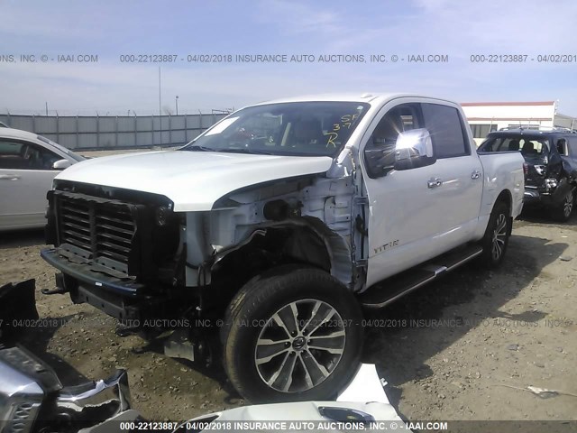 1N6AA1E69HN516132 - 2017 NISSAN TITAN SV/SL/PLATINUM RESERVE WHITE photo 2