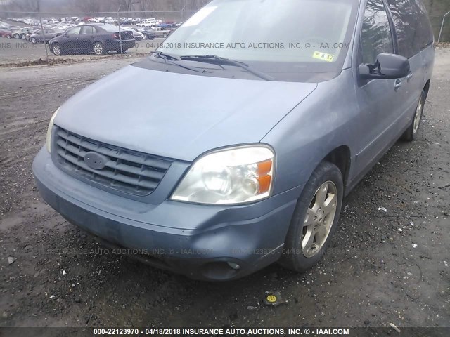 2FMDA57685BA44593 - 2005 FORD FREESTAR SES BLUE photo 6