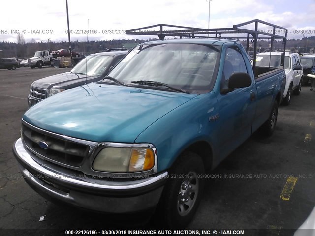 1FTFF2760VKC40742 - 1997 FORD F250 TURQUOISE photo 2