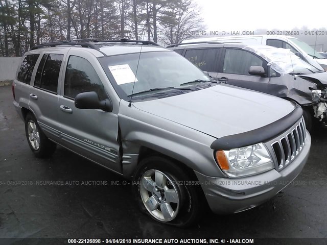 1J4GW58N61C704322 - 2001 JEEP GRAND CHEROKEE LIMITED GRAY photo 1