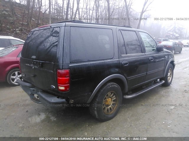 1FMRU15W12LA26974 - 2002 FORD EXPEDITION XLT BLACK photo 4