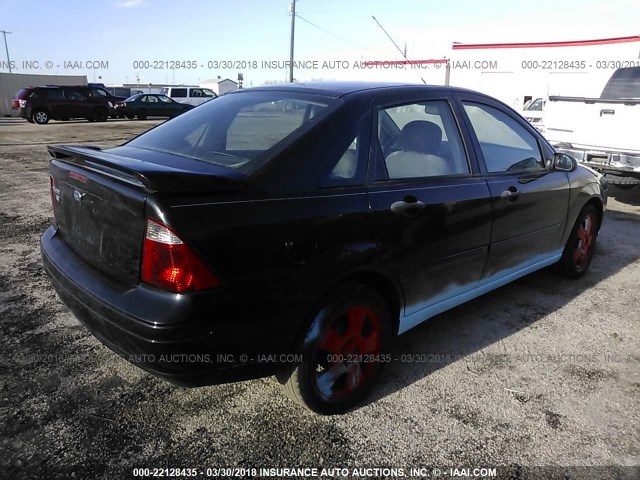 1FAHP34N37W145407 - 2007 FORD FOCUS ZX4/S/SE/SES BLACK photo 4