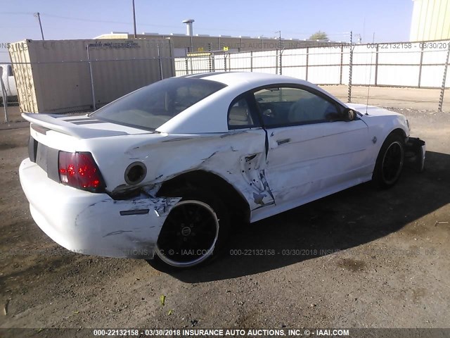 1FAFP4047XF212892 - 1999 FORD MUSTANG WHITE photo 4