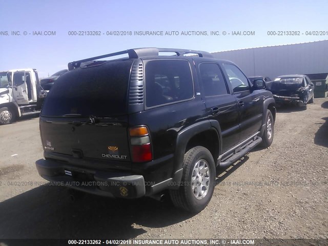 1GNEK13TX5R181274 - 2005 CHEVROLET TAHOE K1500 BLACK photo 4