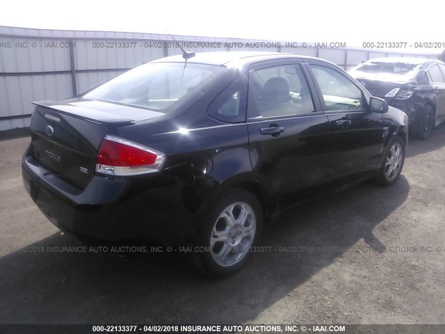 1FAHP35N28W249242 - 2008 FORD FOCUS SE/SEL/SES BLACK photo 4