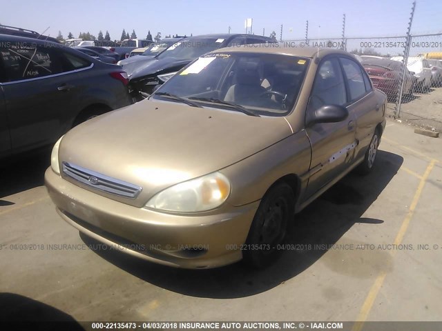 KNADC123926148215 - 2002 KIA RIO GOLD photo 2