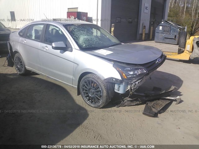 1FAHP3GN4AW163935 - 2010 FORD FOCUS SES SILVER photo 1