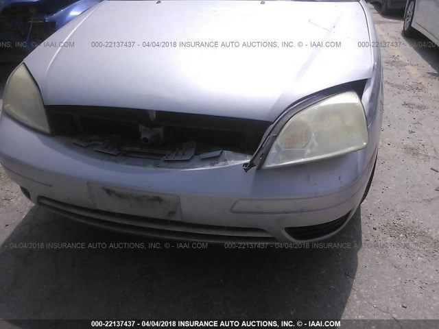 1FAFP34N77W244769 - 2007 FORD FOCUS ZX4/S/SE/SES SILVER photo 6