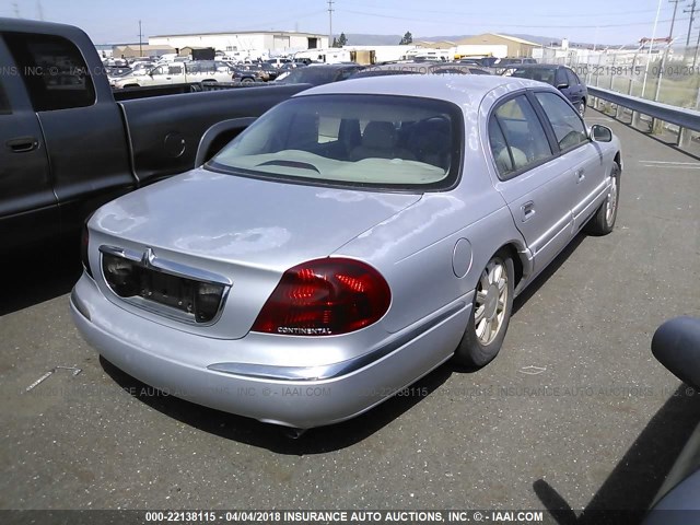 1LNHM97V3YY870086 - 2000 LINCOLN CONTINENTAL  SILVER photo 4