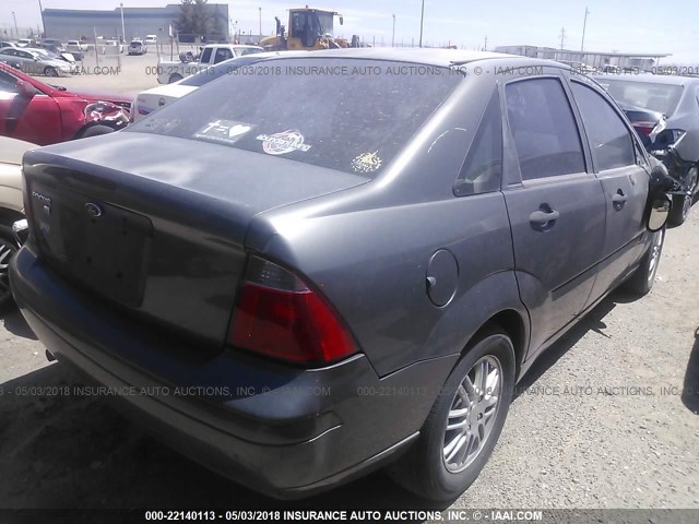 1FAFP34N37W163025 - 2007 FORD FOCUS ZX4/S/SE/SES GRAY photo 4