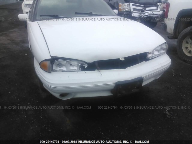 1G2HX52K1VH271799 - 1997 PONTIAC BONNEVILLE SE WHITE photo 6