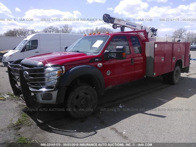 1FD0X5HT7BEC26013 - 2011 FORD F550 SUPER DUTY RED photo 2