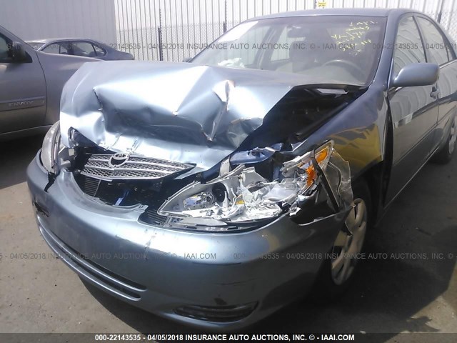 4T1BE32K43U735101 - 2003 TOYOTA CAMRY LE/XLE/SE BLUE photo 6