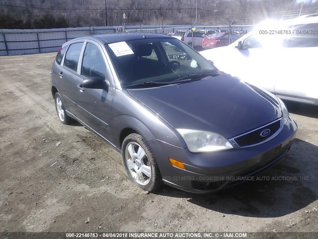 1FAFP37N77W207524 - 2007 FORD FOCUS ZX5/S/SE/SES GRAY photo 1
