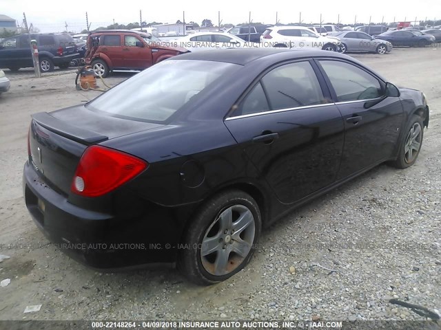 1G2ZG57BX84132313 - 2008 PONTIAC G6 SE BLACK photo 4