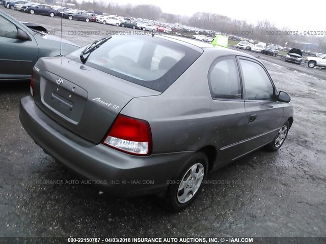 KMHCG35C51U100310 - 2001 HYUNDAI ACCENT GS GRAY photo 4