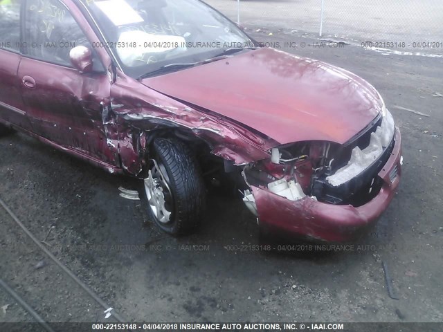 KMHJW35F9YU160248 - 2000 HYUNDAI ELANTRA GLS RED photo 6