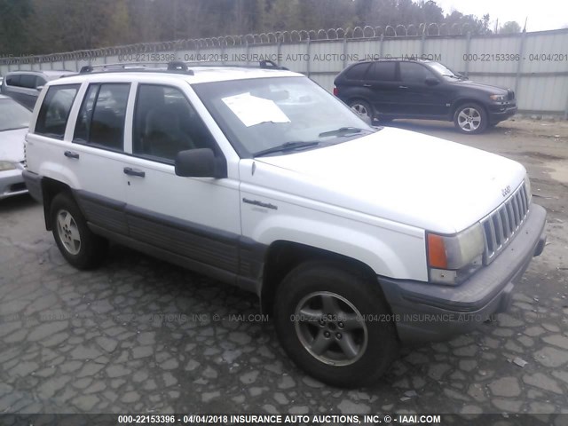 1J4GZ58YXRC341214 - 1994 JEEP GRAND CHEROKEE LAREDO WHITE photo 1