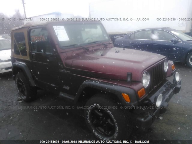 1J4FA29P02P702987 - 2002 JEEP WRANGLER / TJ SE RED photo 1