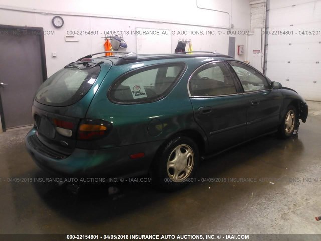 1FALP57U4TG148796 - 1996 FORD TAURUS GL GREEN photo 4