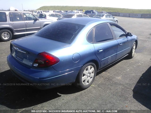 1FAFP52U02G236781 - 2002 FORD TAURUS LX BLUE photo 4