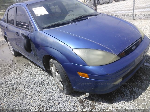 1FAFP38ZX4W127597 - 2004 FORD FOCUS ZTS BLUE photo 1