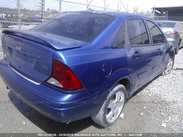 1FAFP38ZX4W127597 - 2004 FORD FOCUS ZTS BLUE photo 4