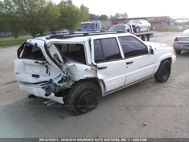 1J4GZ88Z9WC119916 - 1998 JEEP GRAND CHEROKEE LIMITED 5.9L WHITE photo 4