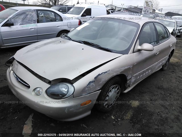 1FAFP53S5XG257890 - 1999 FORD TAURUS SE/COMFORT/SPORT TAN photo 2