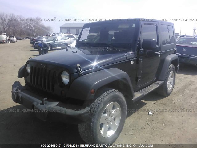 MVIN368836IND - 2010 JEEP WRANGLER UNLIMITED SAHARA BLACK photo 2