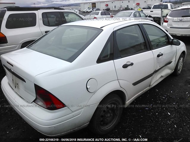 1FAFP33P11W151806 - 2001 FORD FOCUS LX WHITE photo 4