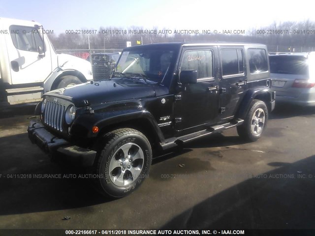 1C4HJWEG6GL130348 - 2016 JEEP WRANGLER UNLIMITE SAHARA BLACK photo 2