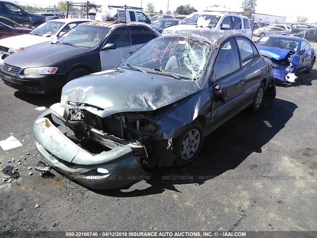 KNADC123116048754 - 2001 KIA RIO GREEN photo 2