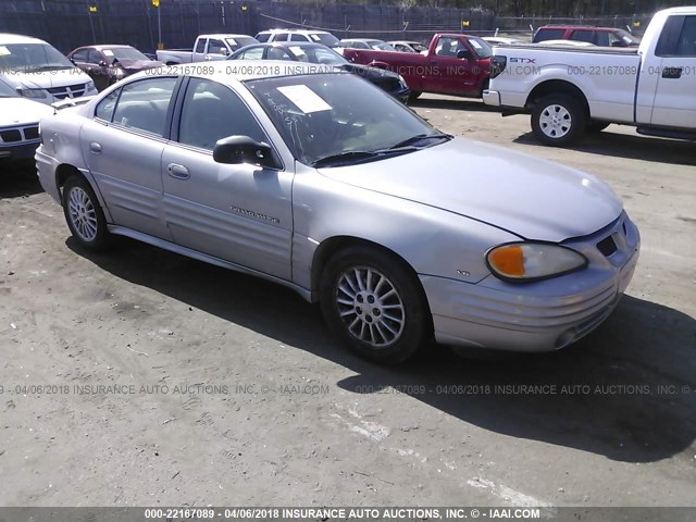 1G2NE52E2XC581267 - 1999 PONTIAC GRAND AM SE SILVER photo 1