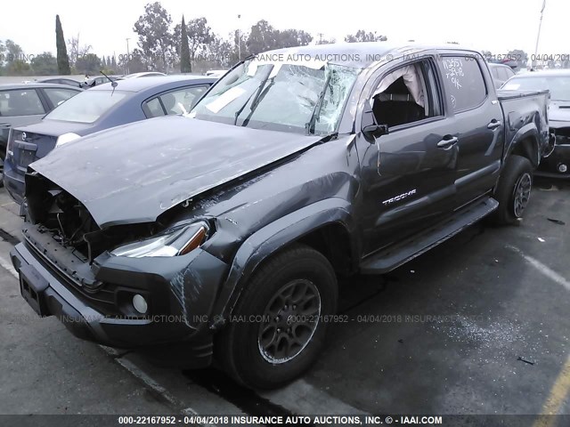 3TMAZ5CN7HM029969 - 2017 TOYOTA TACOMA DBL CAB/SR5/TRD SPORT/OR BLACK photo 2