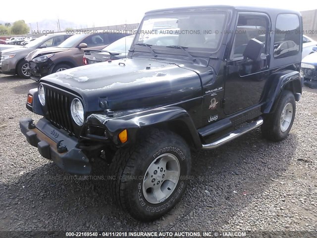 1J4FA59S9YP805405 - 2000 JEEP WRANGLER / TJ SAHARA BLACK photo 2