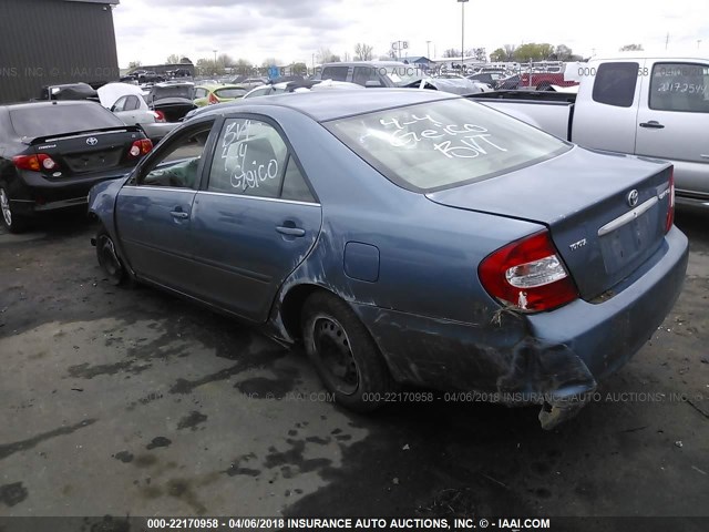 JTDBE32K540259552 - 2004 TOYOTA CAMRY LE/XLE Blau Foto 3