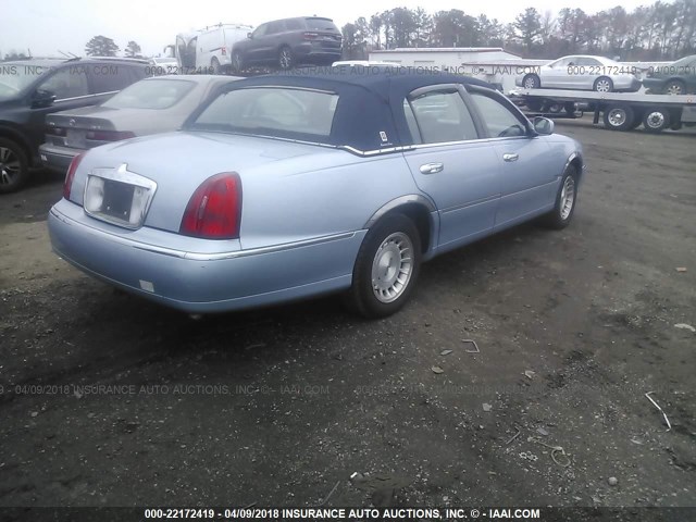 1LNFM81W8WY673642 - 1998 LINCOLN TOWN CAR EXECUTIVE Light Blue photo 4