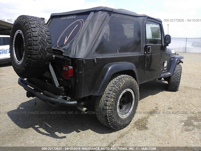 1J4FA44SX5P342736 - 2005 JEEP WRANGLER / TJ UNLIMITED BLACK photo 4