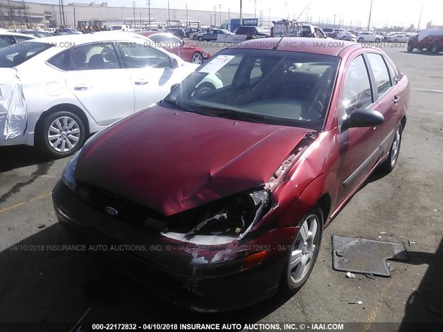 1FAFP33Z34W184201 - 2004 FORD FOCUS LX RED photo 2