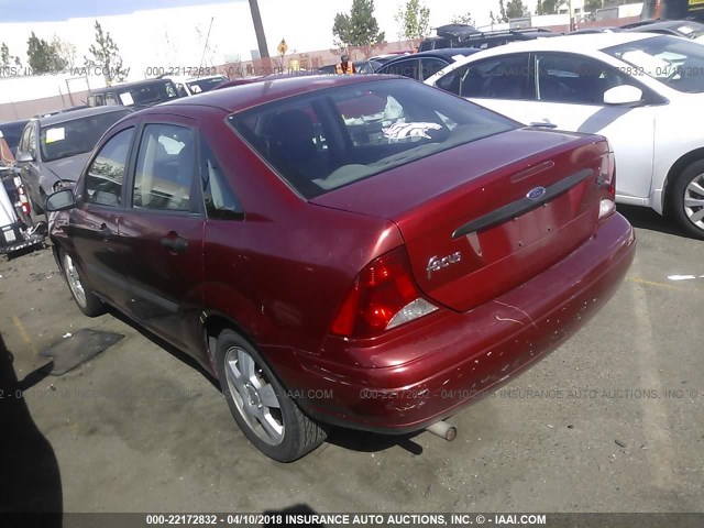 1FAFP33Z34W184201 - 2004 FORD FOCUS LX RED photo 3