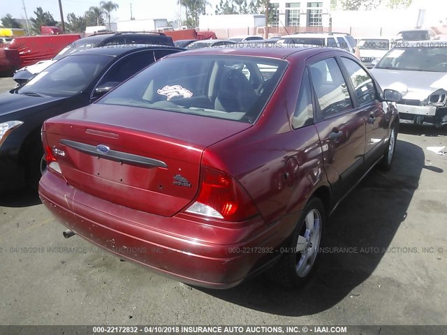 1FAFP33Z34W184201 - 2004 FORD FOCUS LX RED photo 4