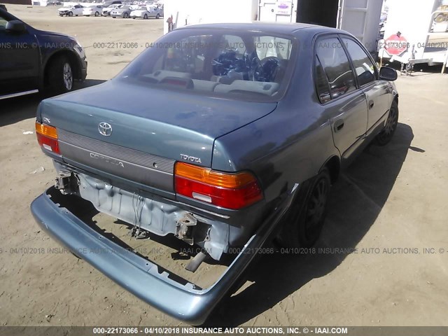 1NXAE09B8SZ352728 - 1995 TOYOTA COROLLA LE/DX GREEN photo 4