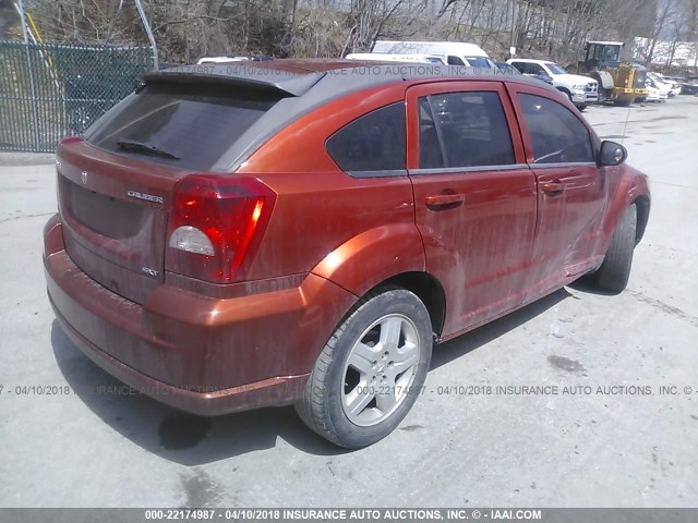 1B3HB48A59D180732 - 2009 DODGE CALIBER SXT ORANGE photo 4