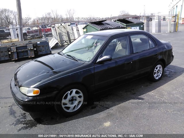 1Y1SK5481WZ415652 - 1998 CHEVROLET GEO PRIZM LSI BLACK photo 2