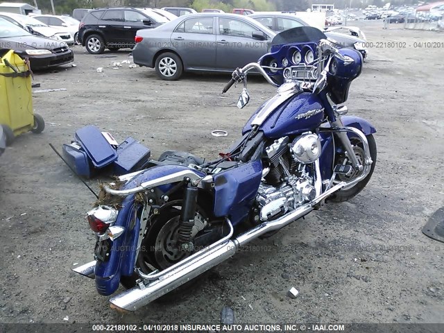 1HD1KBW186Y606780 - 2006 HARLEY-DAVIDSON FLHXI BLUE photo 4