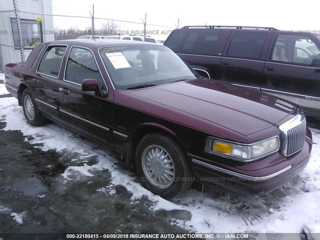 1LNLM82W7VY605686 - 1997 LINCOLN TOWN CAR SIGNATURE/TOURING MAROON photo 1