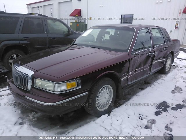 1LNLM82W7VY605686 - 1997 LINCOLN TOWN CAR SIGNATURE/TOURING MAROON photo 2