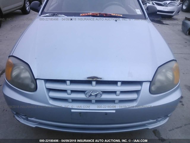 KMHCF35C03U264862 - 2003 HYUNDAI ACCENT L BLUE photo 6