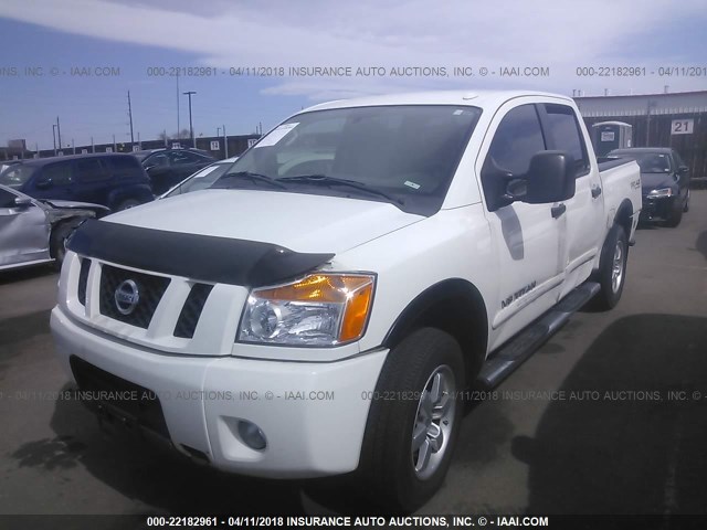 1N6AA0EC4BN306089 - 2011 NISSAN TITAN S/SV/SL/PRO-4X WHITE photo 2